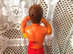 bionic man red pants bk view